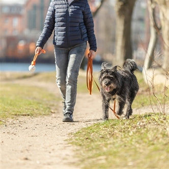 TRIXIE SLEEPLIJN MET RUBBER BEKLEED ZONDER HANDLUS ORANJE 5 MTRX1,5 CM